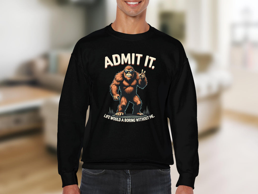 Wearing the Admit It Sweatshirt by Garment Graphics, you make a bold statement with a Bigfoot holding a toothbrush. The design declares, ADMIT IT. LIFE WOULD BE BORING WITHOUT ME, against a softly blurred interior backdrop.