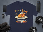Garment Graphics offers a navy T-shirt featuring a hot and spicy pie design topped with Hot & Spicy and You Wanna a Piece of Me? below. Perfect for family sizing, it pairs well with accessories like phones, smartwatches, sneakers, speakers, and dumbbells.