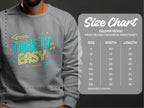 A person in a gray Garment Graphics sweatshirt showcases the vibrant Take It Easy musical graphic design. Next to them is the Gildan 18000 size chart, showing unisex sizing from S to 5XL with detailed width and length measurements in inches.