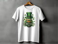 A white t-shirt by Garment Graphics hangs on a wooden hanger against a gray background, featuring an Irish pride print: a ginger-bearded man with a green top hat and shamrock designs, with the text St. Patricks Day, capturing the festive spirit of St. Patricks Day T-Shirts.