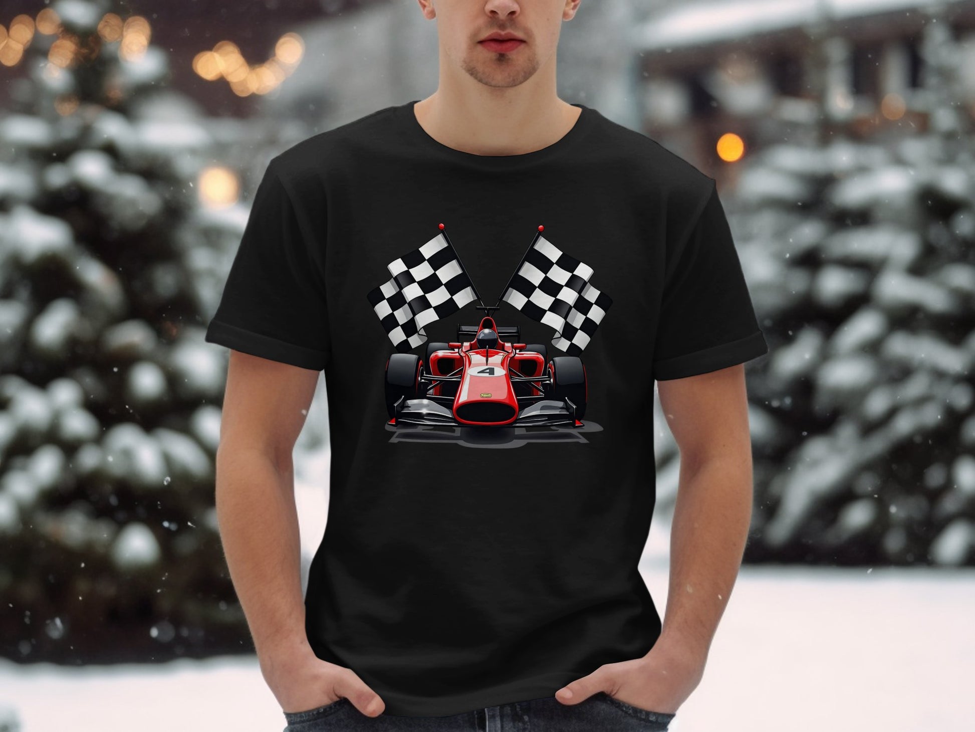 Wearing a sleek Garment Graphics black T-shirt featuring a red race car and crossed checkered flags, a motorsport enthusiast contrasts the snowy background of blurred trees and lights with their vibrant attire.