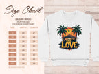 The size chart for the Garment Graphics 18000 heavy blend crewneck sweatshirt shows unisex sizing from S to 5XL on the left with width and length in inches. On the right, a white One Love Sweatshirts design features a sunset graphic between palm trees and One Love text.