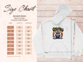 White hooded sweatshirt by Garment Graphics with a bold bulldog wearing a crown above City King, exuding urban edge style. The fiery background adds flair. A size chart for the Gildan 18500 City King hoodies is on the left, detailing measurements in inches from S to 5XL.