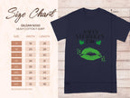 Garment Graphics presents a dark blue graphic T-shirt with Happy St. Patricks Day text, two green clovers, and a bold green lip print. It includes a Gildan 5000 heavy cotton size chart (S to 5XL) detailing width and length in inches.