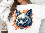 Wearing Garment Graphics fierce wolf sweatshirt, a person makes a bold statement with an intense yellow-eyed wolf head against an orange background, their face partially out of frame.