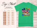 The green Garment Graphics T-shirt features Loud & Proud with graphics of a megaphone, star, thumbs-up, and speech bubble. Display your passion confidently! Family sizing chart (S to 5XL) on the left shows dimensions in inches. Background: light wood, dimensions marked on diagram.