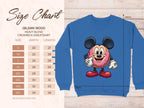 Image of a blue Garment Graphics sweatshirt with a cute cartoon donut character resembling a mouse, wearing red shoes and gloves. On the left, see the size chart for this whimsical Gildan 18000, available in S to 5XL. Add it to your playful wardrobe for extra whimsy.