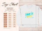The image shows a size chart for Garment Graphics Gildan 18000 unisex heavy blend crewneck sweatshirt, sizes S to 5XL, with widths and lengths in inches. A white Take It Easy graphic sweatshirt is displayed on the right.