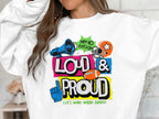 The individual is wearing a stylish Garment Graphics white sweatshirt adorned with a vibrant graphic of a megaphone, football helmet, and foam finger. The unisex Loud and Proud Sweatshirt features bold text: Hey Ho Lets Go Loud & Proud Lets Make Some Noise!.