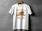 Garment Graphics presents a family-friendly white tee with the Hot and Spicy Pie Design, featuring a pie slice on a plate with whipped cream, Hot & Spicy text above, and You Wanna a Piece of Me? below, set against a dark gray background.