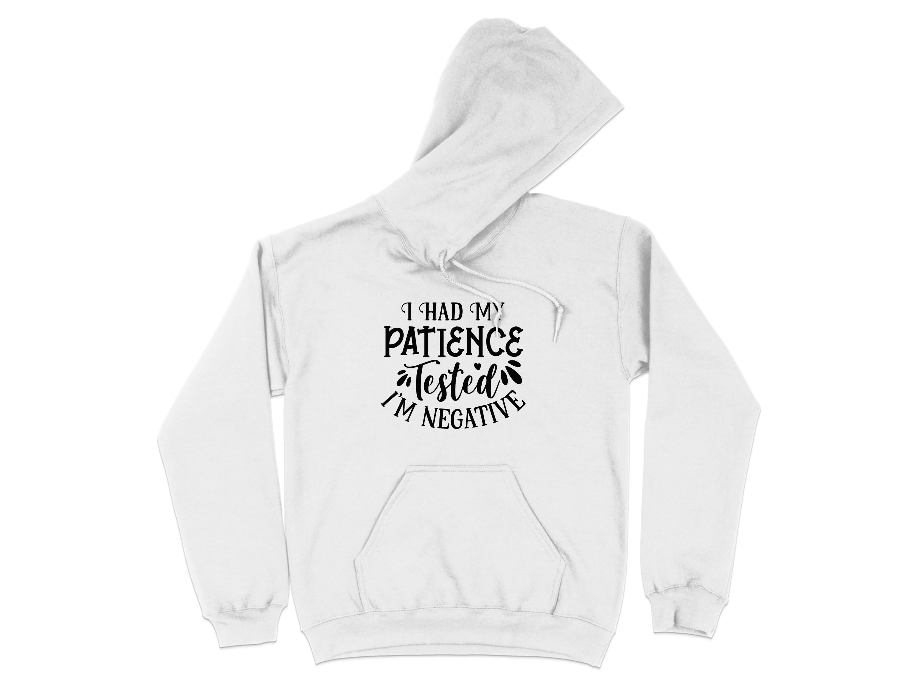 Garment Graphics presents a novelty graphic hoodie featuring I had my patience tested, Im negative in bold black. It has a front pocket and an adjustable drawstring hood, effortlessly blending style and humor.