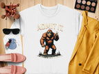 The Garment Graphics white sweatshirt showcases a Bigfoot character holding up two fingers with the slogan Admit it. Life would be boring without me. Its an ideal casual wear piece paired with a yellow blazer, pink loafers, sunglasses, makeup brushes, a pouch, and an eyeshadow palette.