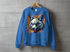 Garment Graphics presents a blue sweatshirt with a striking wolf graphic, featuring open jaws and sharp fangs against an orange splash background, displayed on a wooden hanger—perfect for expressing your wild side.