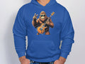 Someone wears a cool Garment Graphics hoodie featuring a gorilla with sunglasses, an electric guitar, and a peace sign. Ideal for music lovers, this hoodie effortlessly blends fun and style.