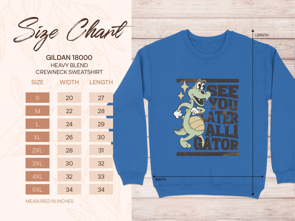This blue Garment Graphics sweatshirt showcases a cartoon alligator holding a basketball with See you later alligator text. It features unisex Gildan 18000 sizing from small to 5XL.