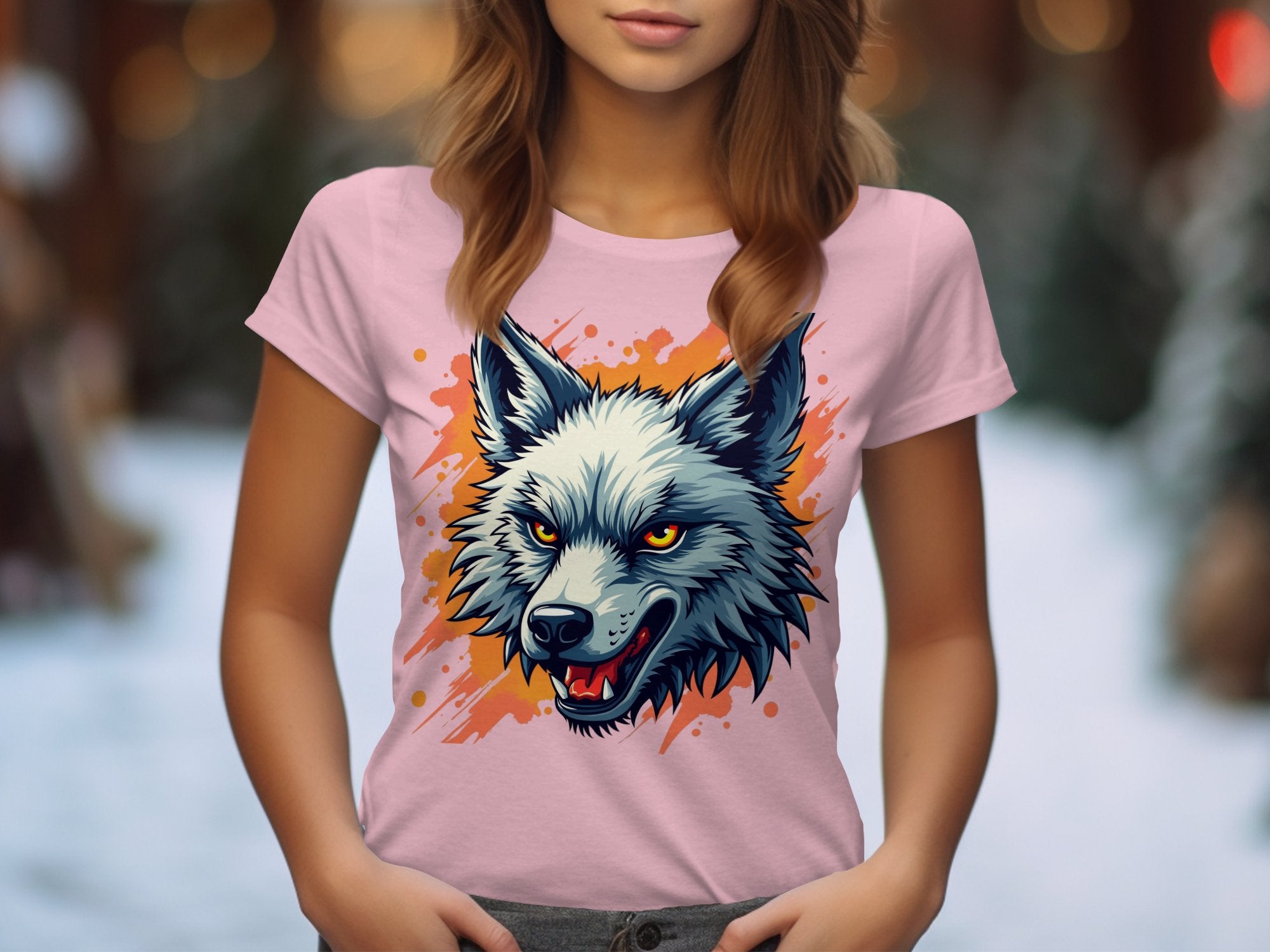 A bold woman faces forward in a Garment Graphics pink T-shirt, 100% cotton, showcasing a stylized wolfs head. The backdrop is a snowy forest blur as her hands rest casually in her pockets.