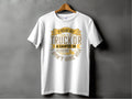 A white t-shirt from Garment Graphics hangs on a wooden hanger against a gray backdrop. It features a yellow and brown message: If hes got golf clubs in his truck or a camper in his driveway, I dont hire him, with a playful truck graphic.