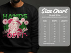 Garment Graphics Wild Side Sweatshirts include a black design with bold cowboy-hat graphics, floral details, and HANDS OFF! in red and green. Unisex sizing is available from S to 5XL; check the Gildan 18000 size chart for measurements on the right.