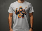A person wears a Garment Graphics white T-shirt with Bigfoot, looking like a chill gorilla in sunglasses, holding an electric guitar and making a peace sign. Perfect for music lovers, the design rests on a plain dark gray background.