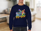 A person is wearing a dark blue Garment Graphics sweatshirt featuring a vibrant design of two figures in colorful street dance attire. Below the artwork, the text Risk Taker Street Dance captures the spirit of fearless competition.