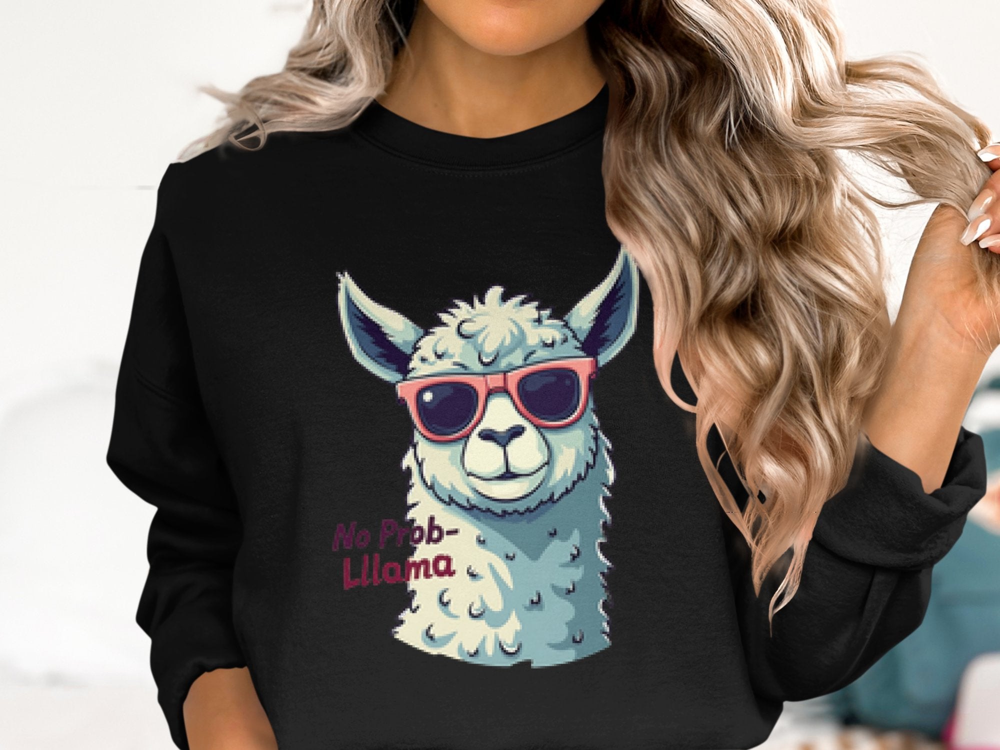Someone with long, wavy hair sports a humorous Garment Graphics sweatshirt featuring a llama in sunglasses. The unisex No Prob-Llama design says No Prob-Llama.