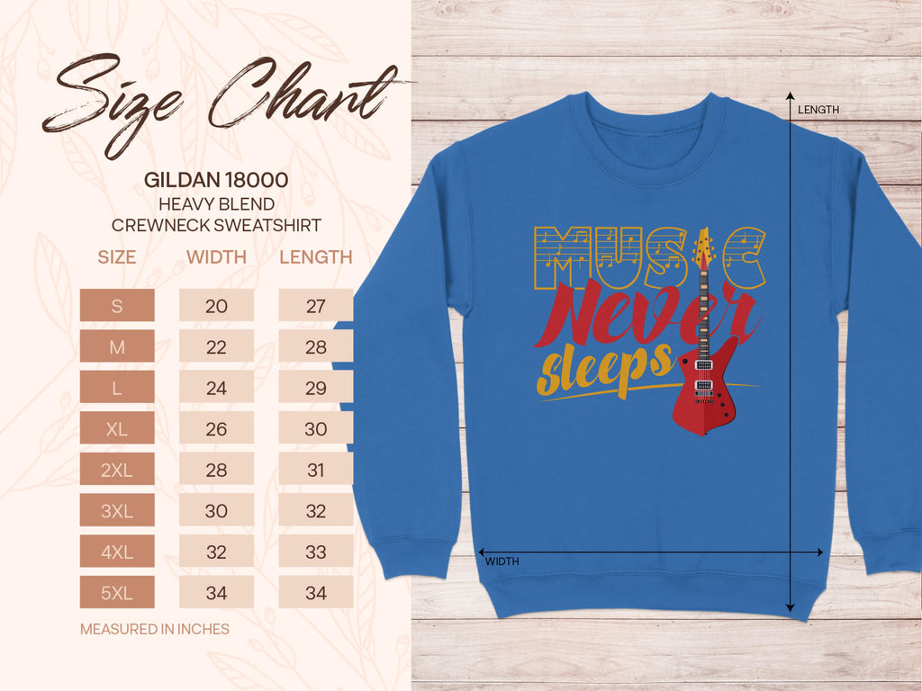 Next to a blue Music Never Sleeps sweatshirt by Garment Graphics, featuring a guitar, theres a size chart for the vibrant Gildan 18000 heavy blend crewneck. It displays sizes S-5XL with width and length in inches, ideal for music lovers.