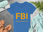 Garment Graphics blue T-shirt with FBI: Female Boob Inspector in yellow makes an ideal gag gift. Styled with a light blue purse, brown sandals, and a green and white striped shirt topped by a watch on a gray surface. Available in womens sizing for the perfect fit!.