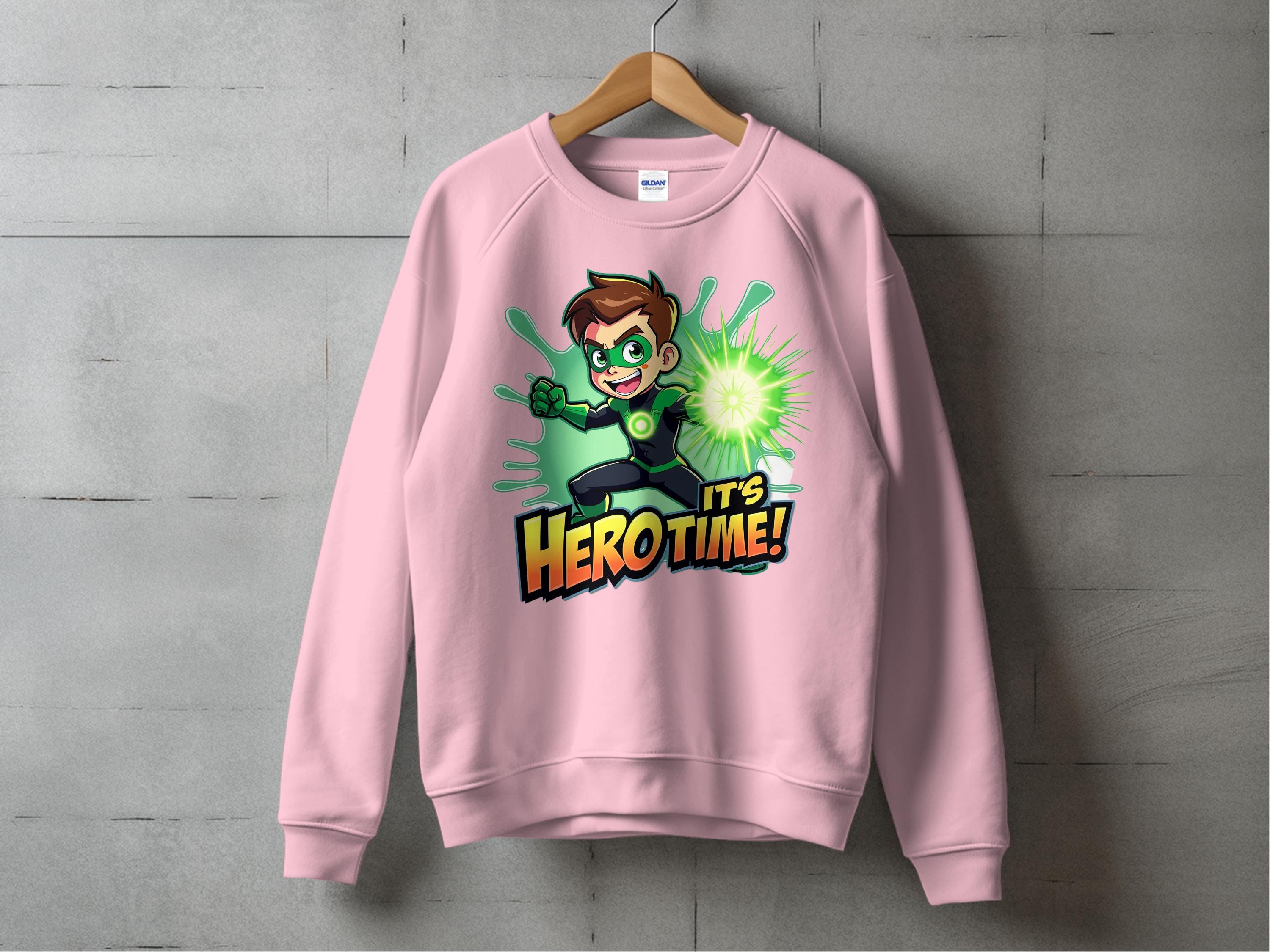 The Its Herotime sweatshirt by Garment Graphics features a spiky brown-haired animated character. The youth’s wrist device emits green energy, and It’s Hero Time! stands out in bold yellow and black, making it perfect for any adventure-loving wardrobe.