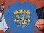 Garment Graphics presents a blue sweatshirt with the phrase, If hes got golf clubs in his truck or a camper in his driveway, I dont hire him, in bold yellow and white. Ideal for outdoor lovers, it pairs perfectly with a water bottle, towel, basketball, and sneakers.