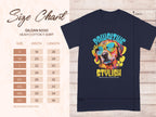 The ad from Garment Graphics features a black Dog T-Shirt with a vibrant pup wearing sunglasses, captioned Chillin Like A Canine Villain. A size chart on the left shows measurements for sizes S to 5XL by width and length in inches, ensuring the perfect fit for every Paw-sitive Stylish fan.