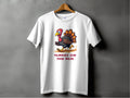 This Garment Graphics classic fit white T-shirt features a funny cartoon turkey running with TURKEY ON THE RUN in bold red text below, displayed on a hanger against a gray wall. Perfect for adding humor to your wardrobe.