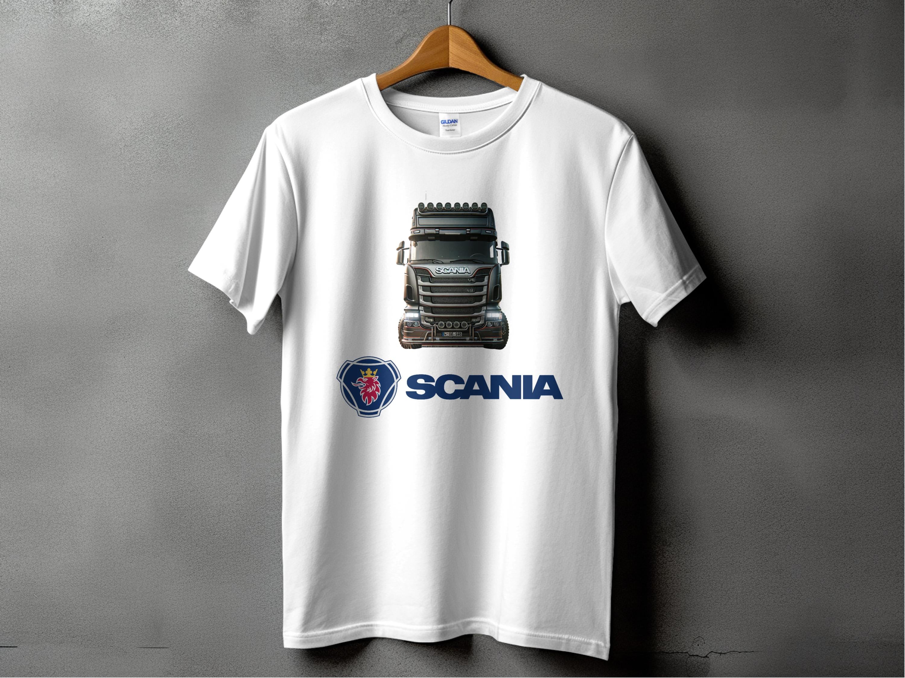 A white T-shirt from Garment Graphics, displayed against a gray background, features an image of a Scania truck and the iconic blue logo beneath it, ideal for truck enthusiasts who value quality and style.