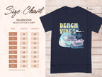 A Garment Graphics dark graphic tee showcases a Beach Vibes design with a classic car, surfboards, waves, and palm trees. It comes with a size chart for the Gildan 5000 shirt, offering measurements from S to 5XL in inches.
.