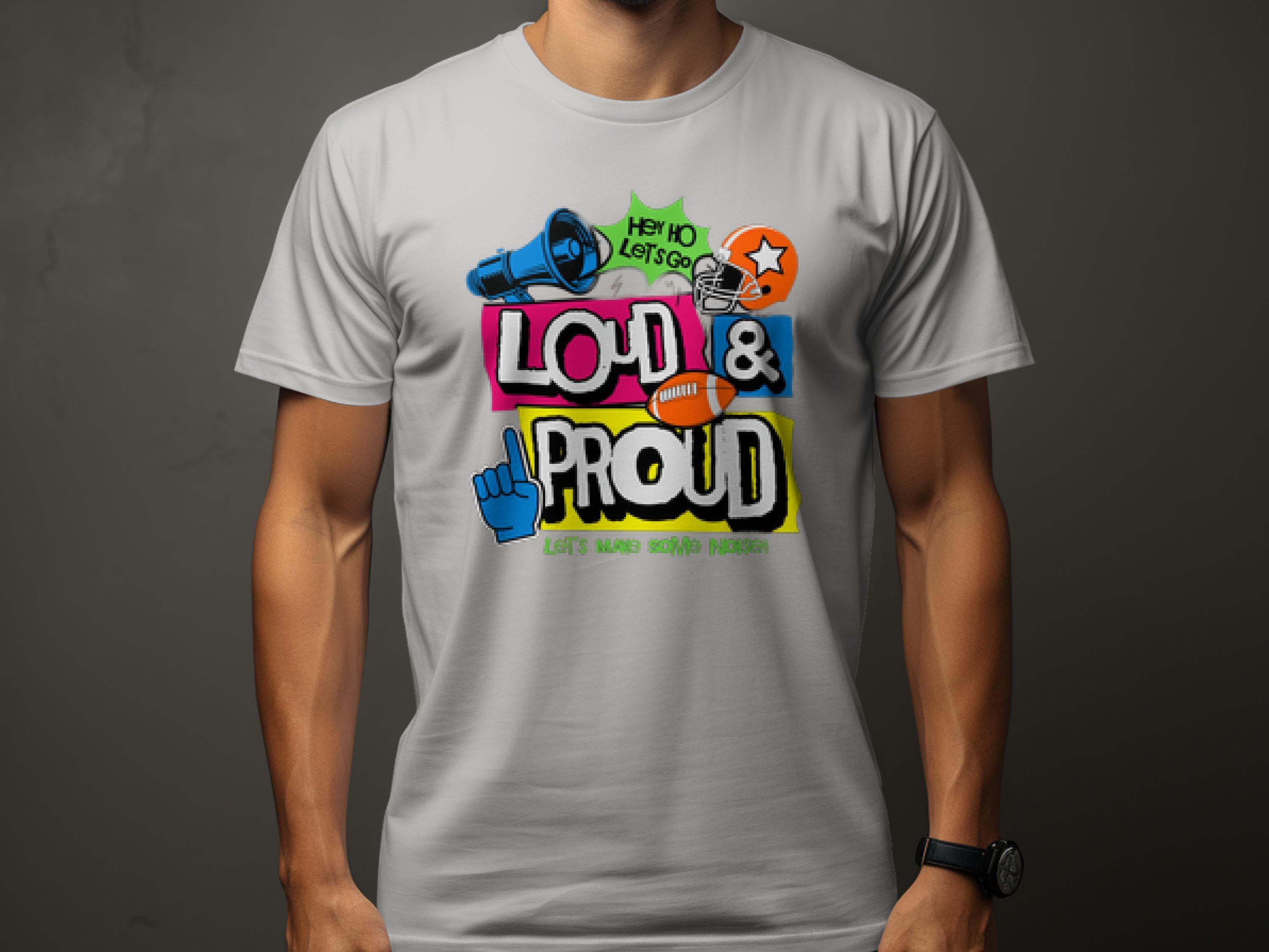 A person wearing a Garment Graphics white t-shirt with colorful graffiti-style text, Loud & Proud, featuring a megaphone, star, and foam finger. Ideal for football sports enthusiasts to showcase passion, it also reads Hey Ho Lets Go! Lets make some noise!.