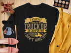 A black sweatshirt from Garment Graphics with a funny graphic saying, If hes got golf clubs in his truck or a camper in his driveway, I dont hire him, surrounded by chic items like a yellow blazer, makeup palette, brushes, sunglasses, shoes, a watch, and a small bag.