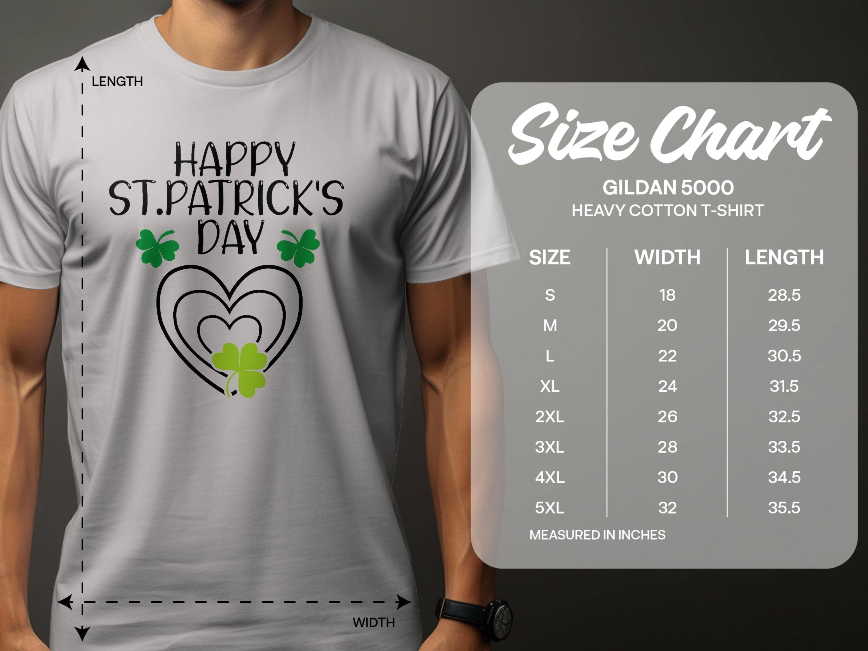 A person is wearing a graphic gray T-shirt by Garment Graphics, featuring Happy St. Patricks Day and clover designs. A size chart on the right shows measurements for Gildan 5000 heavy cotton T-shirts, detailing width and length in inches across various sizes.