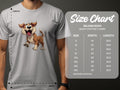 Wearing a Garment Graphics white T-shirt ideal for dog enthusiasts, showcasing a cartoon dog. Beside them is the size chart for Gildan 5000 heavy cotton T-shirts, detailing sizes S to 5XL with widths and lengths in inches.