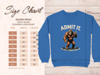 Garment Graphics presents a blue crewneck sweatshirt with a bold Bigfoot graphic and the phrase Admit it. Life would be boring without me. This statement piece includes a size chart for Gildan 18000, offering sizes S to 5XL in inches.