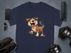 A navy blue T-shirt by Garment Graphics, featuring a playful brown and white cartoon dog surrounded by a smartphone, smartwatch, black shoes, portable speaker, and dumbbells on a gray surface; perfect for dog lovers.