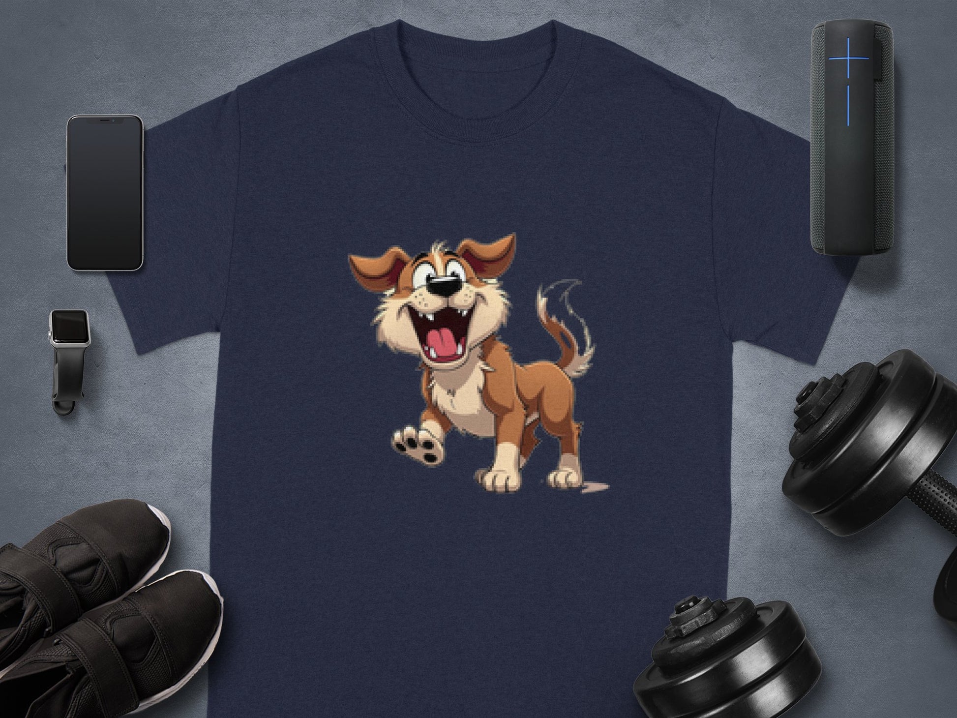 A navy blue T-shirt by Garment Graphics, featuring a playful brown and white cartoon dog surrounded by a smartphone, smartwatch, black shoes, portable speaker, and dumbbells on a gray surface; perfect for dog lovers.