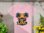 The Garment Graphics pink T-shirt is ideal for beach outings, with a design of palm trees, a tropical sunset, and a mountain. Featuring the bold slogan One Love, its displayed on concrete amidst green and yellow potted plants.