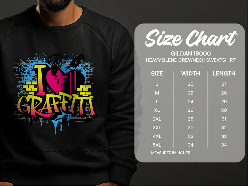 A person sports a Garment Graphics black sweatshirt with vibrant street art-themed I Love Graffiti text. The Gildan 18000 size chart is shown, listing sizes S to 5XL with width and length measurements in inches.
