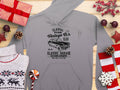 Gray hoodie by Garment Graphics featuring a Classic Vintage Car Club design with a London vintage car. Perfect for automobile enthusiasts, it includes holiday accents: wrapped gifts, candy canes, pinecones, a sweater, and red-berried sprigs on wood.