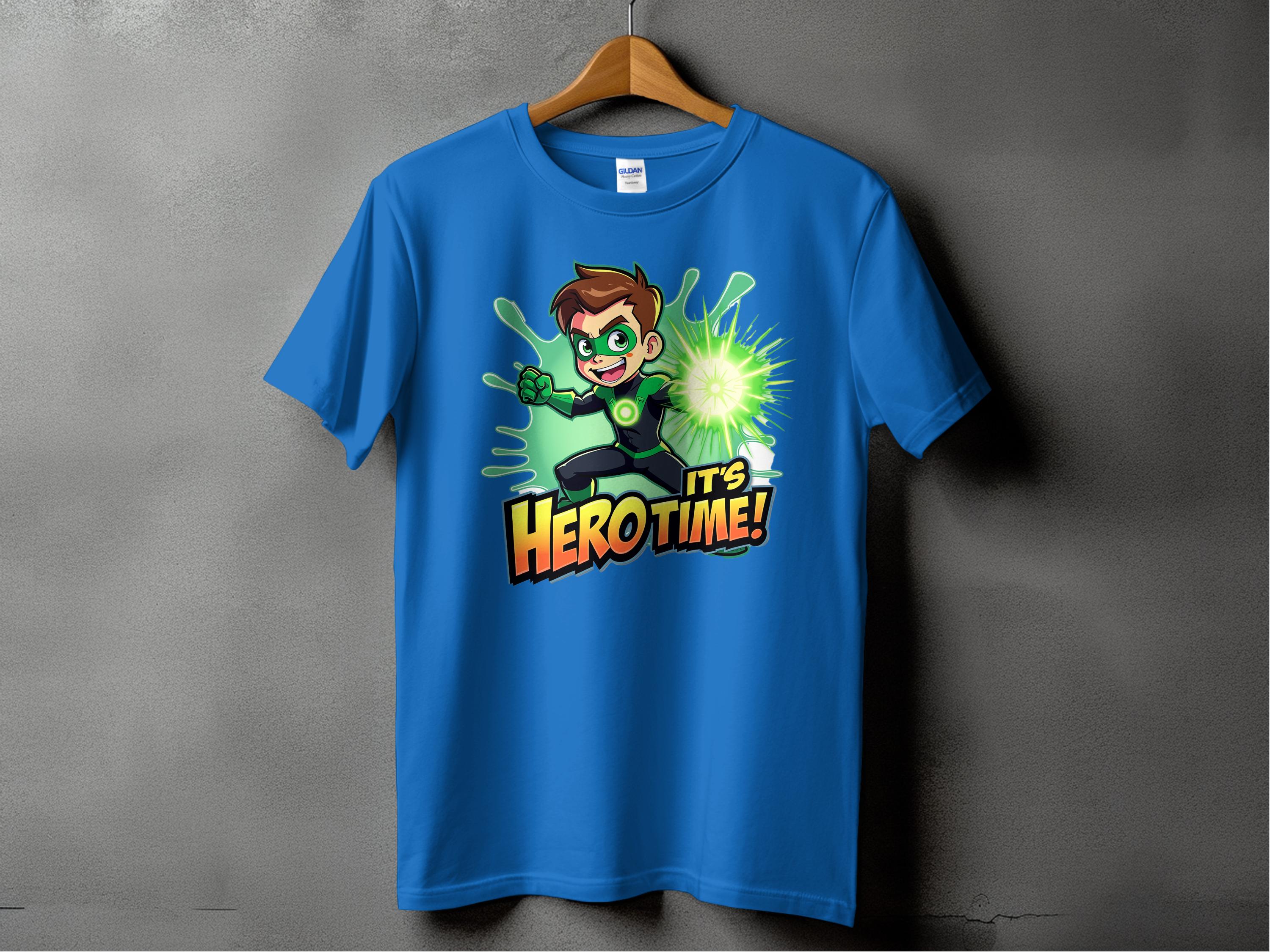 A vibrant blue Garment Graphics t-shirt on a wooden hanger against a gray wall features a superhero cartoon character in a green suit with a glowing hand and the text Its Hero Time! Available in family sizing for heroic style for everyone.