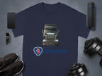 Garment Graphics offers a stylish navy blue T-shirt featuring a Scania truck and logo. Ideal for truck fans, its paired with modern essentials: smartphone, smartwatch, black sneakers, portable speaker, and dumbbell.