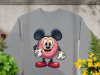 Garment Graphics presents a gray unisex sweatshirt featuring a playful donut character with mouse ears, gloves, and big shoes, pointing and smiling amid plants and yellow flowers.