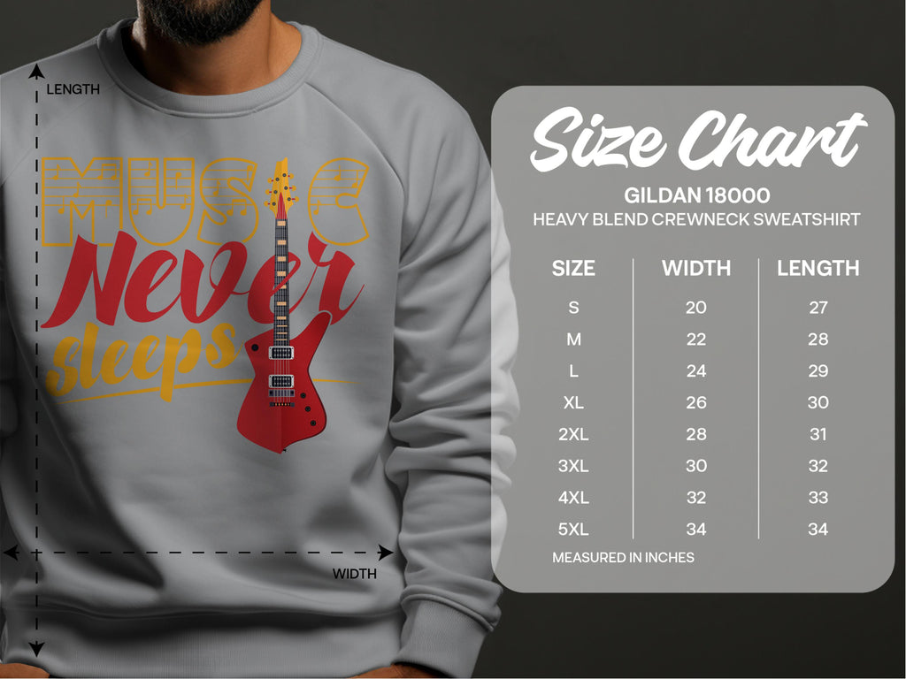 Someone wearing a lively gray Garment Graphics sweatshirt features a vivid red guitar and the phrase Music Never Sleeps, ideal for music lovers. The image includes a size chart for the Gildan 18000, with measurements in inches from S to 5XL.