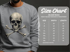A person sports a bold Garment Graphics gray sweatshirt with a skull and crossbones design. Beside them, the size chart for the Gildan 18000 heavy blend crewneck shows sizes S to 5XL, detailing width and length measurements in inches.