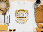 Garment Graphics white sweatshirt with a fun graphic: If hes got golf clubs in his truck or a camper in his driveway, I dont hire him. Pictured with a notebook, pen, scarf, quilted jacket, cup, sunglasses, and yellow quilted wallet.