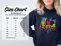 A person wears a navy hooded sweatshirt by Garment Graphics with an I Love Graffiti design. Nearby is a size chart for Gildan 18500 sweatshirts, showing sizes S to 5XL with width and length in inches—a perfect casual wardrobe addition.